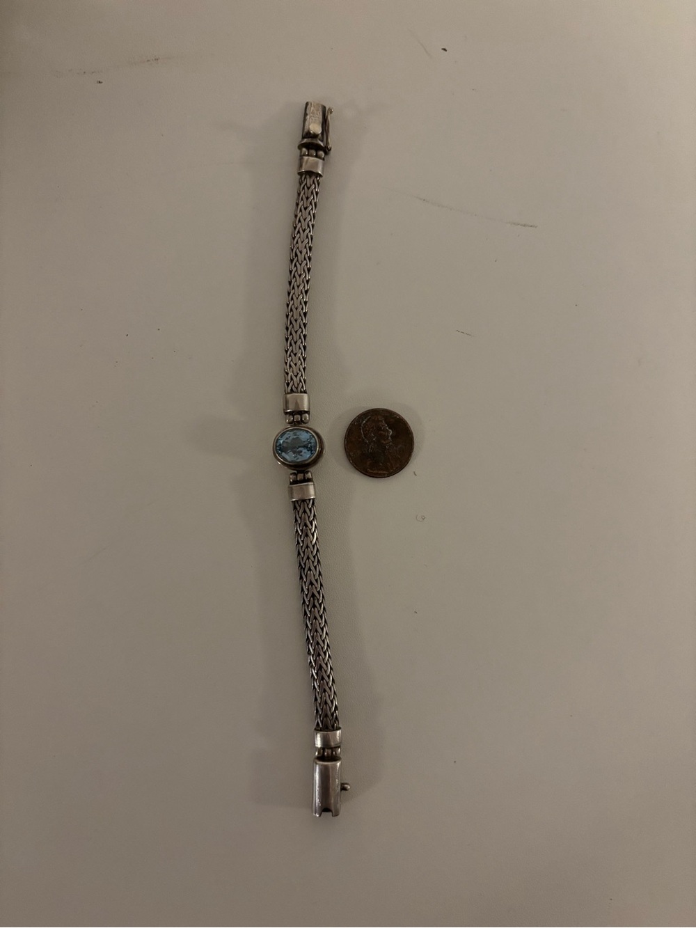 Sterling Silver Mesh Bracelet with Light Blue Oval topaz Stone